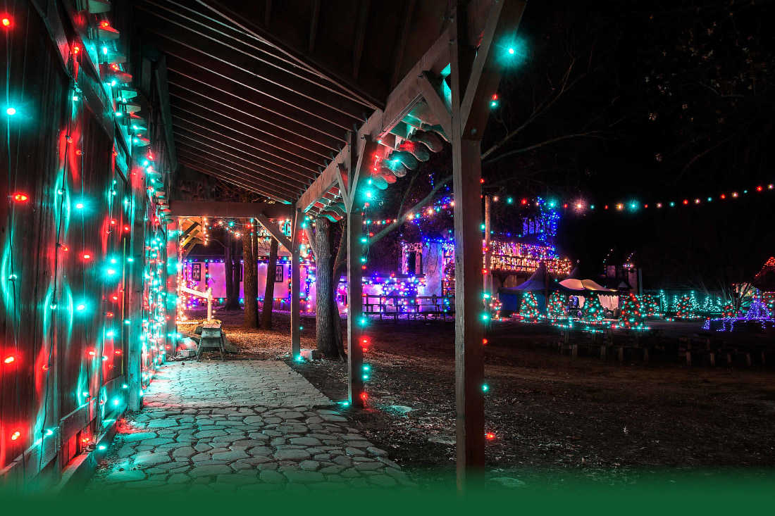 Lit up village with trees